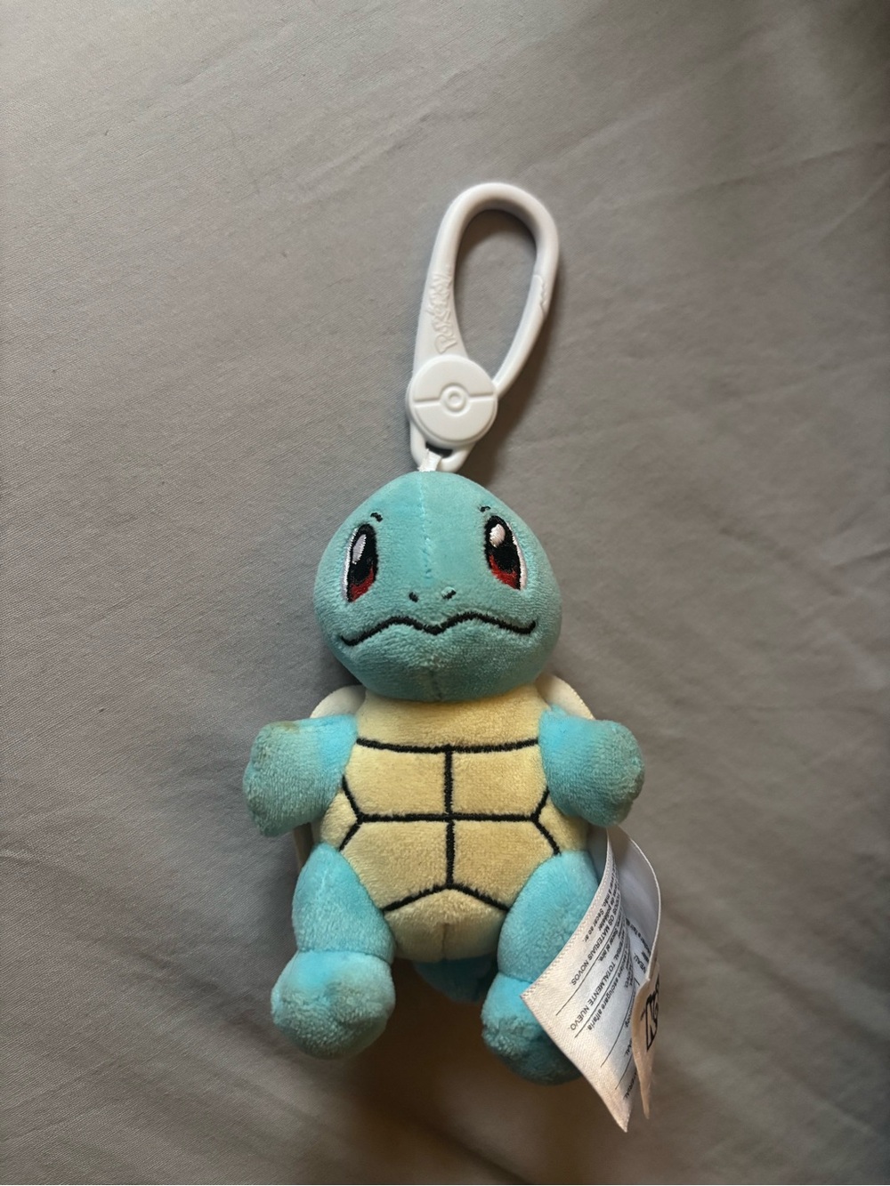 free w/purchase: squirtle plush keychain (discoloured)